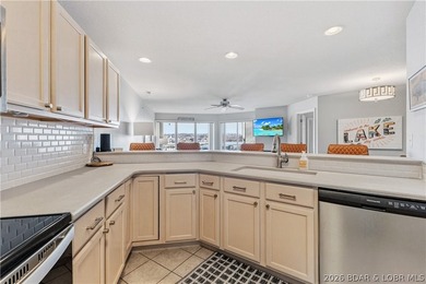 Experience Lake of the Ozarks living at its finest in this - photo 9