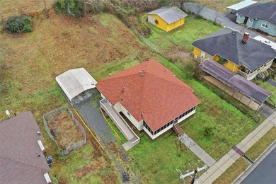 Welcome to this charming and updated bungalow nestled on a quiet