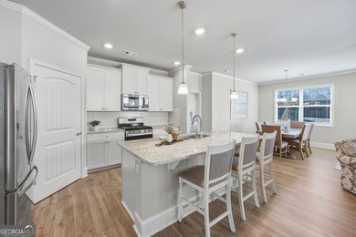 Welcome home to easy, low-maintenance living in this beautifully