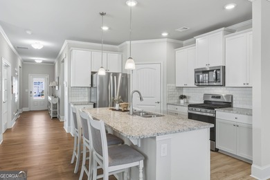 Welcome home to easy, low-maintenance living in this beautifully