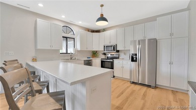 **TURNKEY!** Experience effortless lake living in this