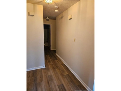 Step into easy living with this beautifully refreshed and - photo 3