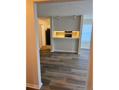 Step into easy living with this beautifully refreshed and - photo 4