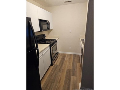 Step into easy living with this beautifully refreshed and - photo 7