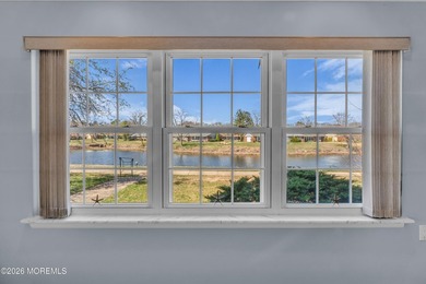Welcome to this lakefront Regency model in the gated 55+ - photo 12