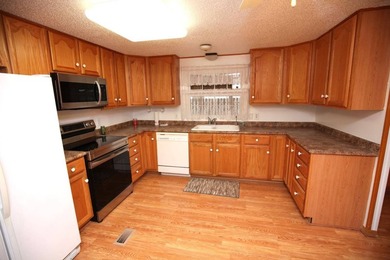 Riverfront Living Without the Worry! Imagine starting your - photo 11