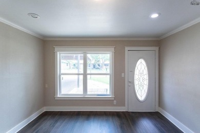 Completely updated 4BR, 2BA home near Lake Wichita! Open floor - photo 4
