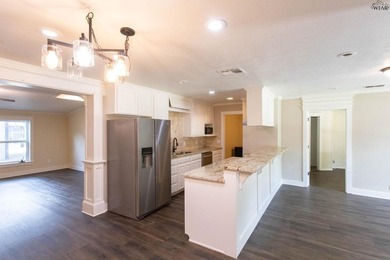 Completely updated 4BR, 2BA home near Lake Wichita! Open floor - photo 6