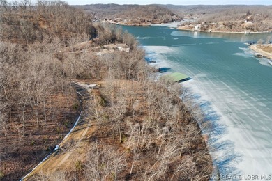 Lakefront building lot in the desirable Eagle Bay Subdivision! - photo 4