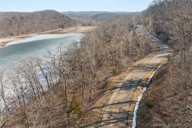 Lakefront building lot in the desirable Eagle Bay Subdivision! - photo 7