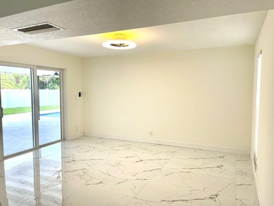 Completely renovated 4-bedroom, 2-bath home with a stunning - photo 11