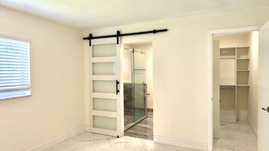 Completely renovated 4-bedroom, 2-bath home with a stunning - photo 12