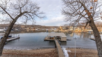 Don't miss this wonderful lake home located at the 8-mile marker - photo 3