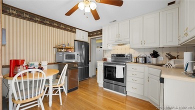 Don't miss this wonderful lake home located at the 8-mile marker - photo 7