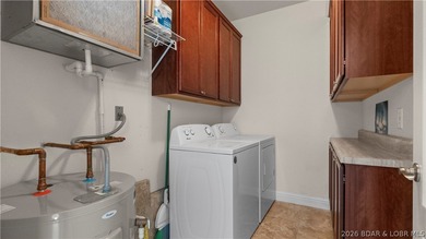 Experience lakefront living at its finest in this beautiful