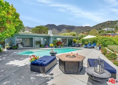 3442 Cloudcroft Dr, Malibu is uniquely positioned on a 15,278 - photo 16