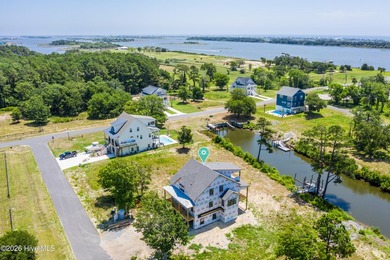 Welcome to 405 Salt Grass Lane, a stunning waterfront retreat in - photo 10