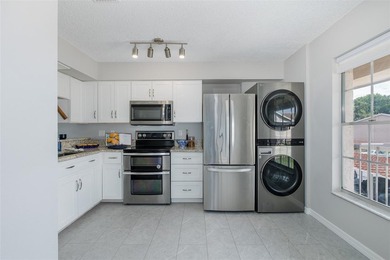 Beautifully UPDATED 2/2, 55+ condo with MODERN UPGRADESpletely - photo 4