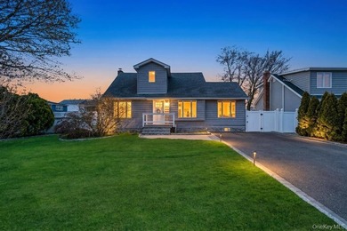 Welcome to this charming 3-bedroom, 2 full bathroom Cape nestled - photo 1