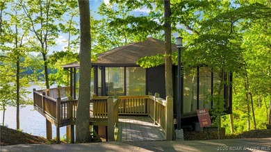 Enjoy treehouse-style living with true lakefront views and all - photo 13