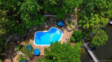 Enjoy treehouse-style living with true lakefront views and all - photo 14