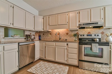 Enjoy low maintenance living and a prime location! Spacious - photo 8