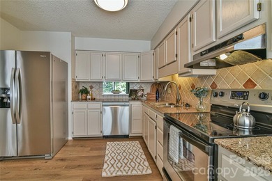 Enjoy low maintenance living and a prime location! Spacious - photo 9