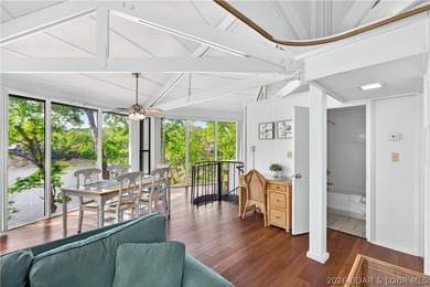 Enjoy treehouse-style living with true lakefront views and all - photo 20