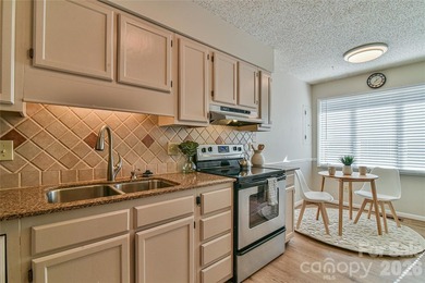 Enjoy low maintenance living and a prime location! Spacious - photo 10