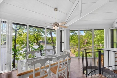 Enjoy treehouse-style living with true lakefront views and all - photo 21