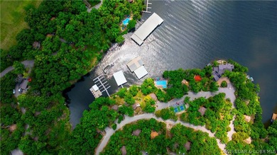 Enjoy treehouse-style living with true lakefront views and all - photo 22