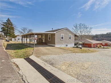 2-bedroom, 1.5 bath home situated on a level 0.13-acre lot with - photo 3