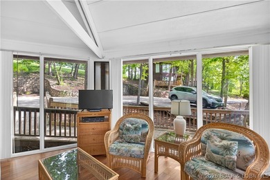 Enjoy treehouse-style living with true lakefront views and all - photo 24