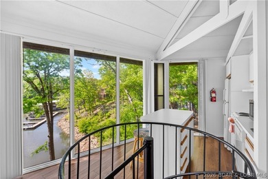 Enjoy treehouse-style living with true lakefront views and all - photo 31