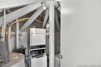Enjoy treehouse-style living with true lakefront views and all - photo 34