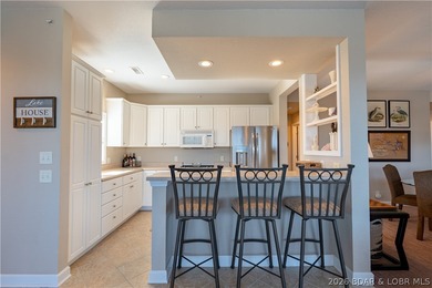 WALK-IN-NO STEPS LAKE LIVING! Experience effortless lakeside