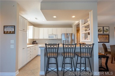 WALK-IN-NO STEPS LAKE LIVING! Experience effortless lakeside