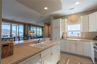 WALK-IN-NO STEPS LAKE LIVING! Experience effortless lakeside