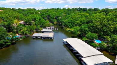 Enjoy treehouse-style living with true lakefront views and all - photo 38