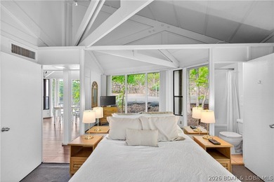 Enjoy treehouse-style living with true lakefront views and all - photo 46