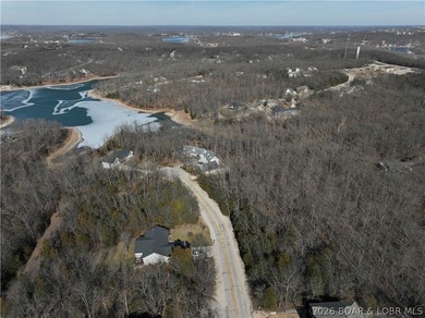 Flat 0.4-acre lot located in Four Seasons POA, offering an - photo 6