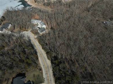 Flat 0.4-acre lot located in Four Seasons POA, offering an - photo 7