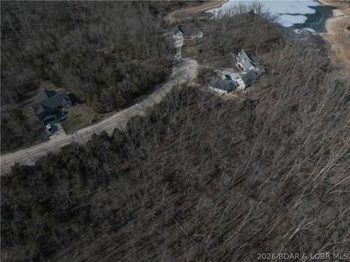 Flat 0.4-acre lot located in Four Seasons POA, offering an - photo 8