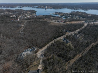 Flat 0.4-acre lot located in Four Seasons POA, offering an - photo 9