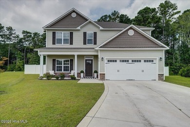 Move-in-ready 4 bedroom, 2.5 bath home perfectly tucked in the - photo 1