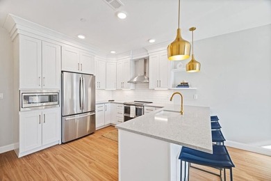 Nestled in Portsmouth's vibrant North End, Unit 104 blends - photo 3