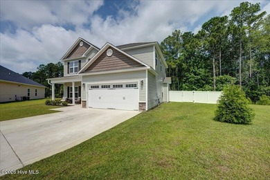 Move-in-ready 4 bedroom, 2.5 bath home perfectly tucked in the - photo 6