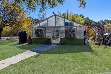 Discover your private oasis on 5 sprawling acres in the