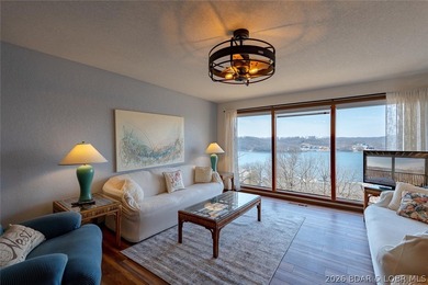 Experience lake life at its finest in this stunning two-level, 1 - photo 2