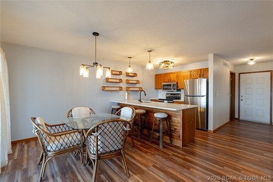 Experience lake life at its finest in this stunning two-level, 1 - photo 7